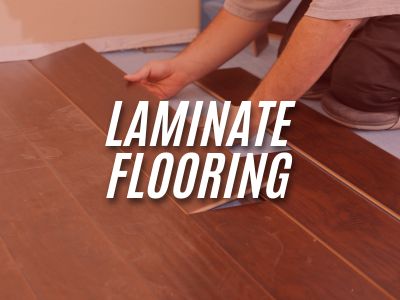 Image with the words "Laminate Flooring" overlaying an image of a person installing new laminate flooring.